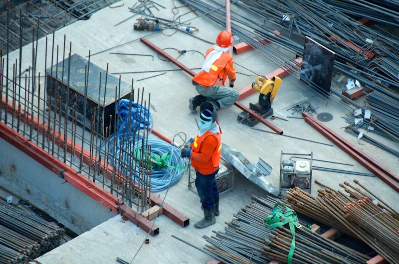 Construction team members wearing safety helmets at a project site